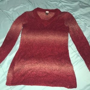 A red sweater. Only been worn twice!